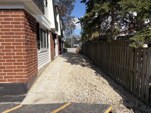 Concrete pavers and river rock installation